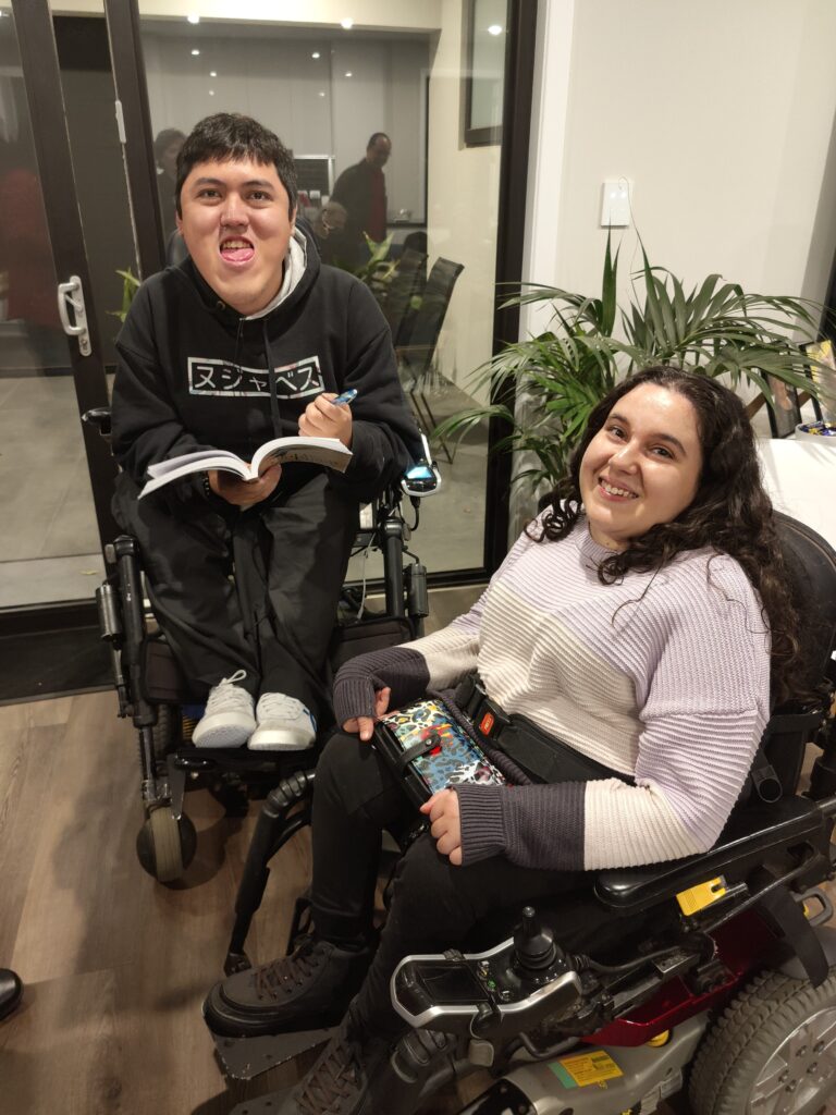 Jono and Chantel are smiling from their wheelchairs